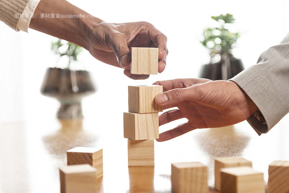 人们建造木桩商务高清图片people-building-piles-wooden-cubes